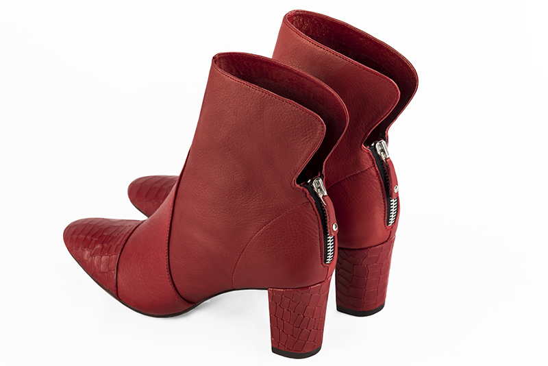 Scarlet red women's ankle boots with a zip at the back. Round toe. Medium block heels. Rear view - Florence KOOIJMAN